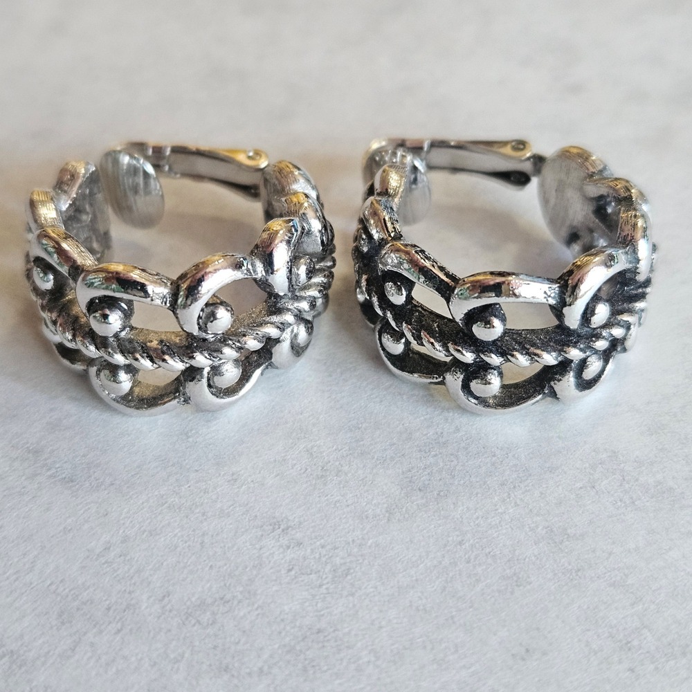 Vtg AVON Silver Tone Clip On Hoop Earrings Braided Rope Ornate Textured Huggie